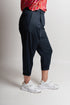 Pantaloni asimmetrici a pieghe Margret